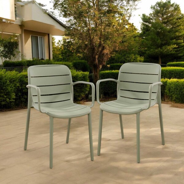 Green patio stacking chairs