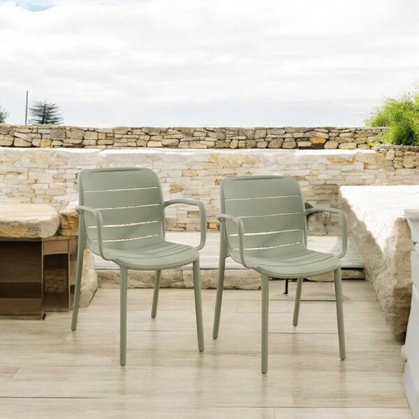 Green patio stacking chairs
